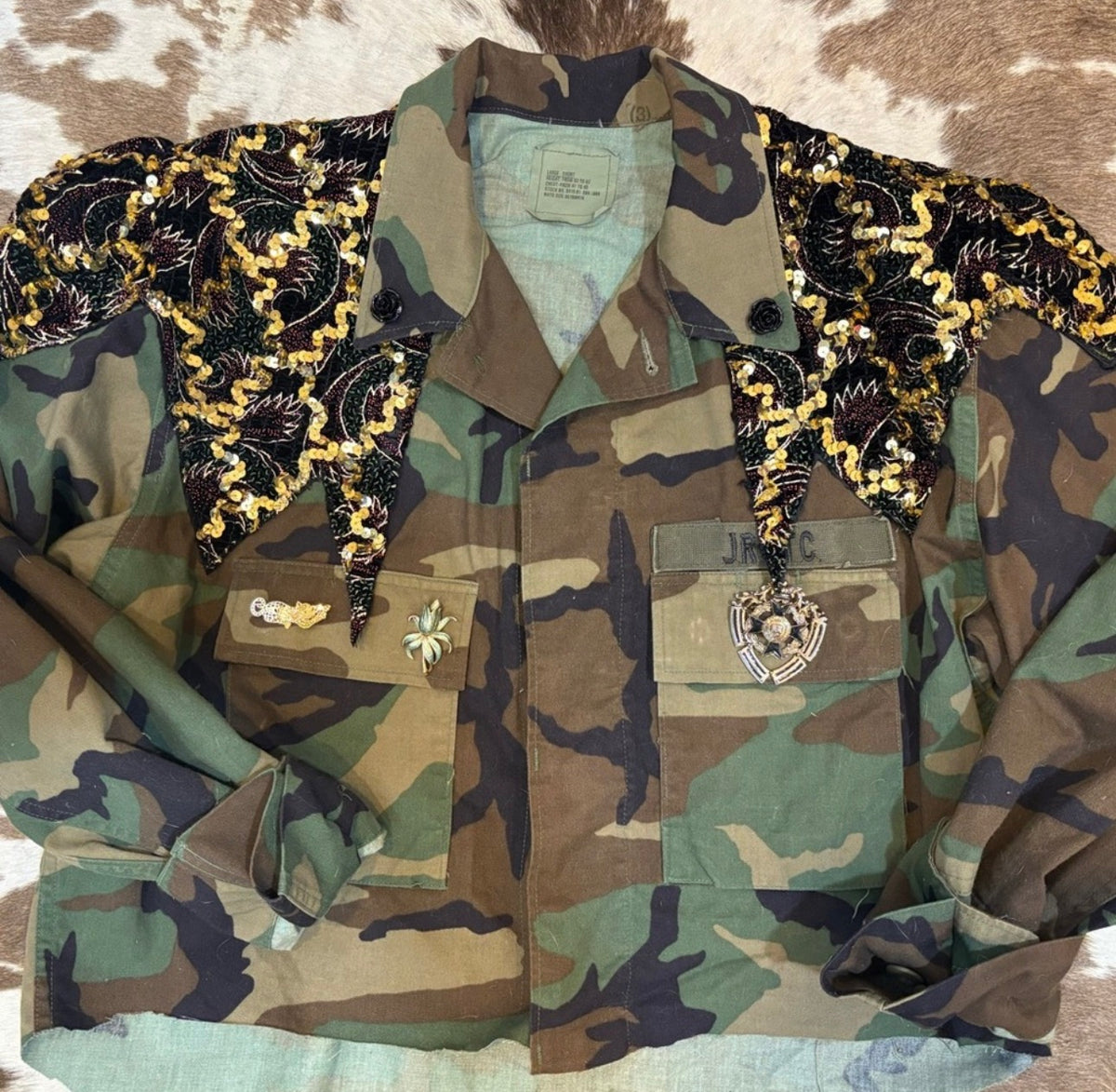 Camouflage Utility Jacket with Embroidered Accents and vintage pins